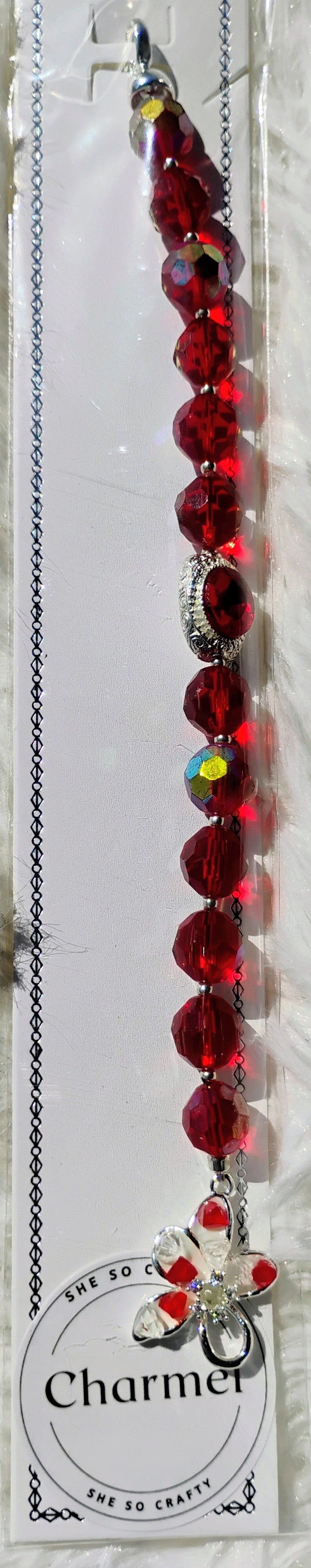 Beautiful red bracelet with flower closure
