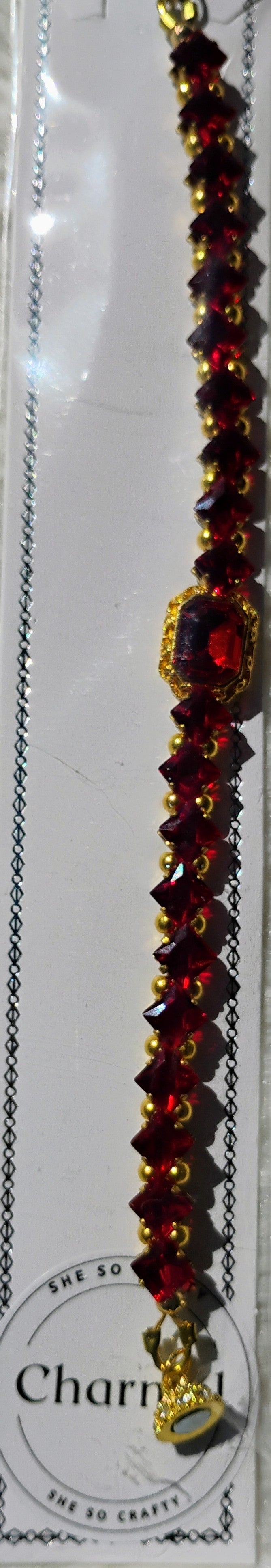 Beautiful red bracelets with rhinestone closure golden accent