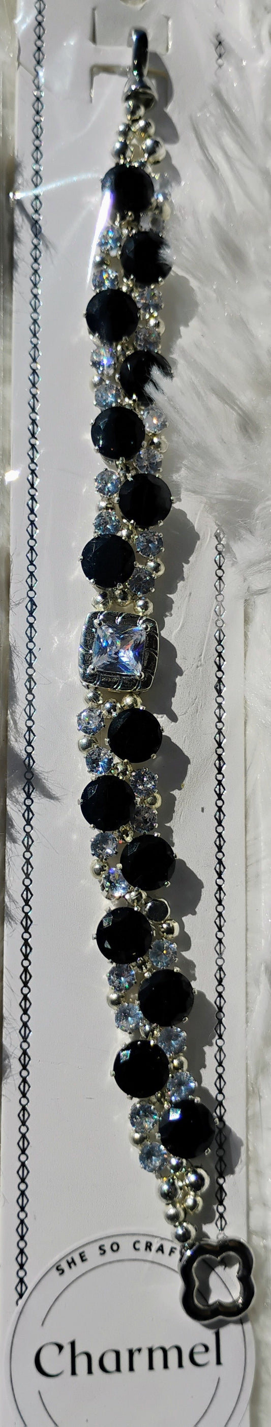 Beautiful black and shiny rhinestone bracelet with clovers closure