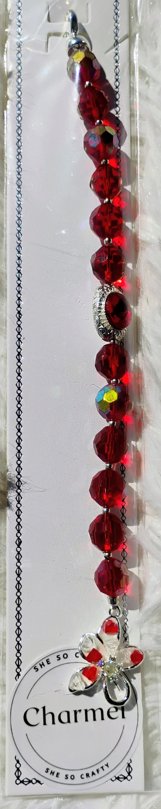 Beautiful red bracelet with flower closure
